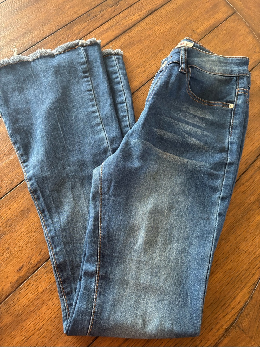 Red Bottoms Mid-Blue Flare Jeans with Frayed Hem